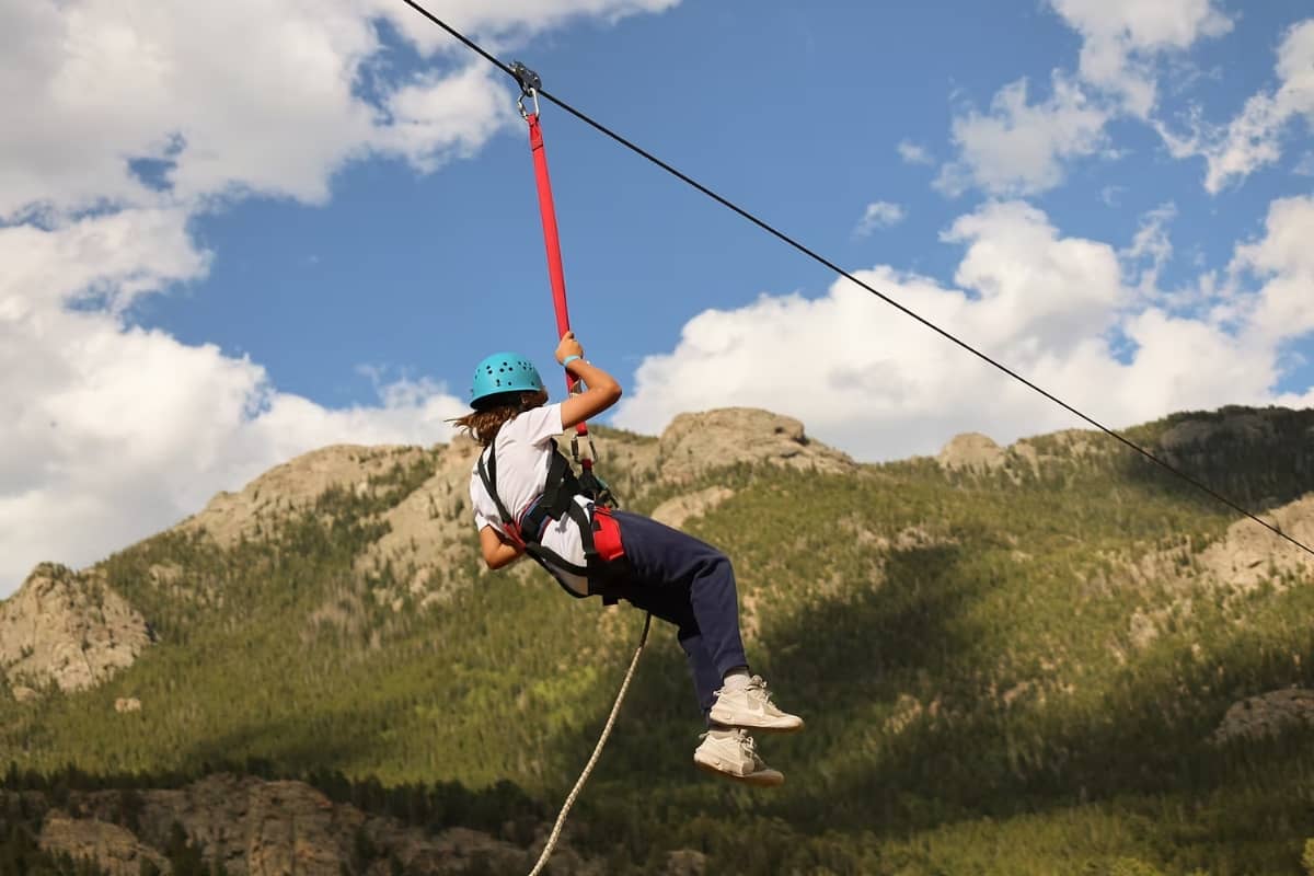 Camper ziplining at camp Annunciation Heights