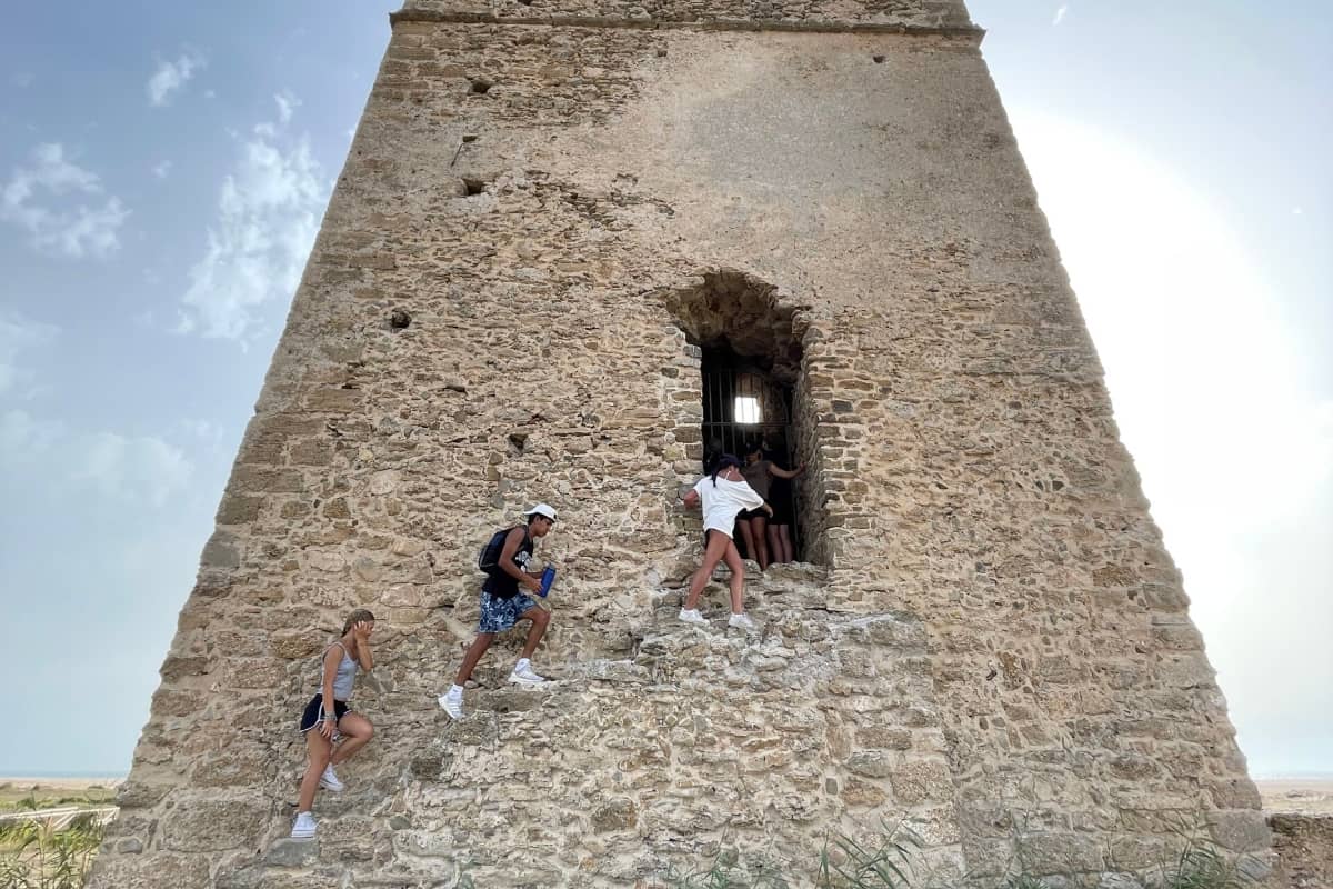 Campers exploring old castle