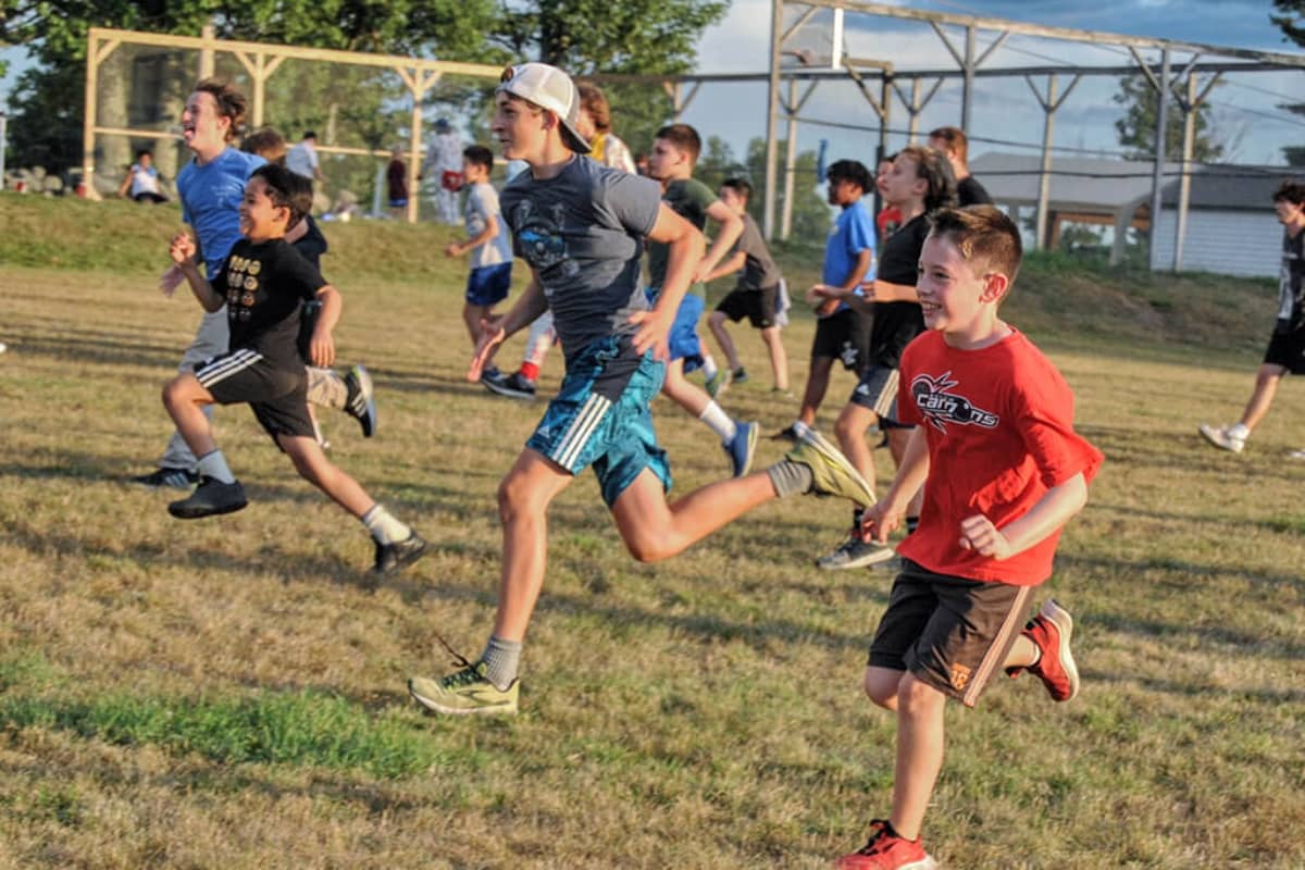 Campers running and having fun