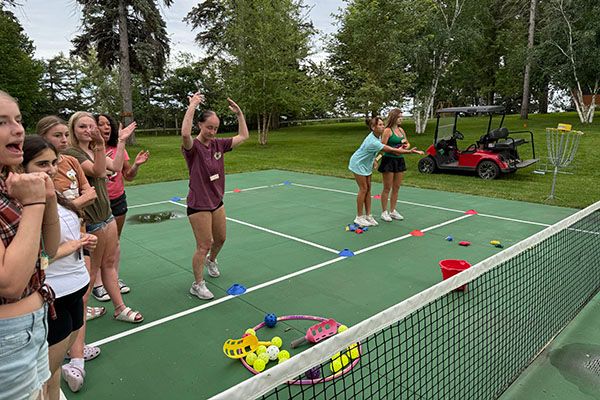 Girls at the tennis ball courts
