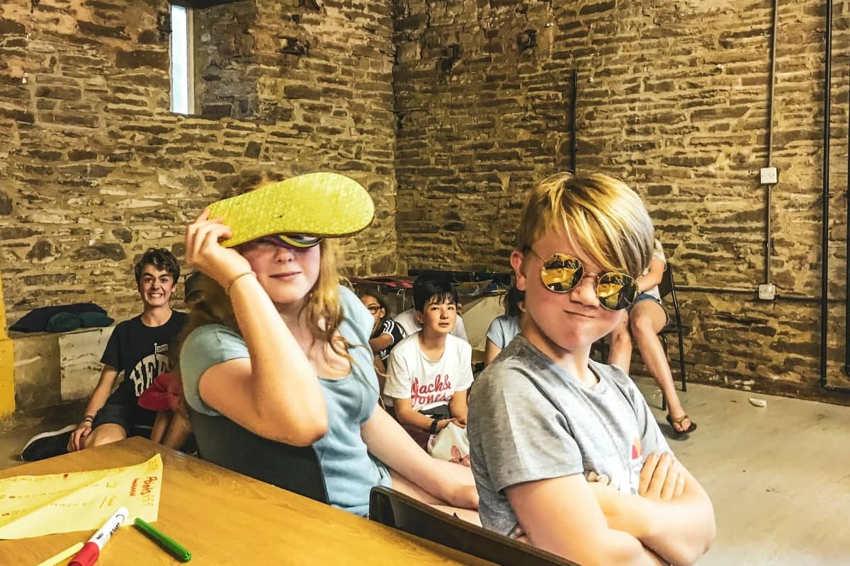 Children smiling while at camp