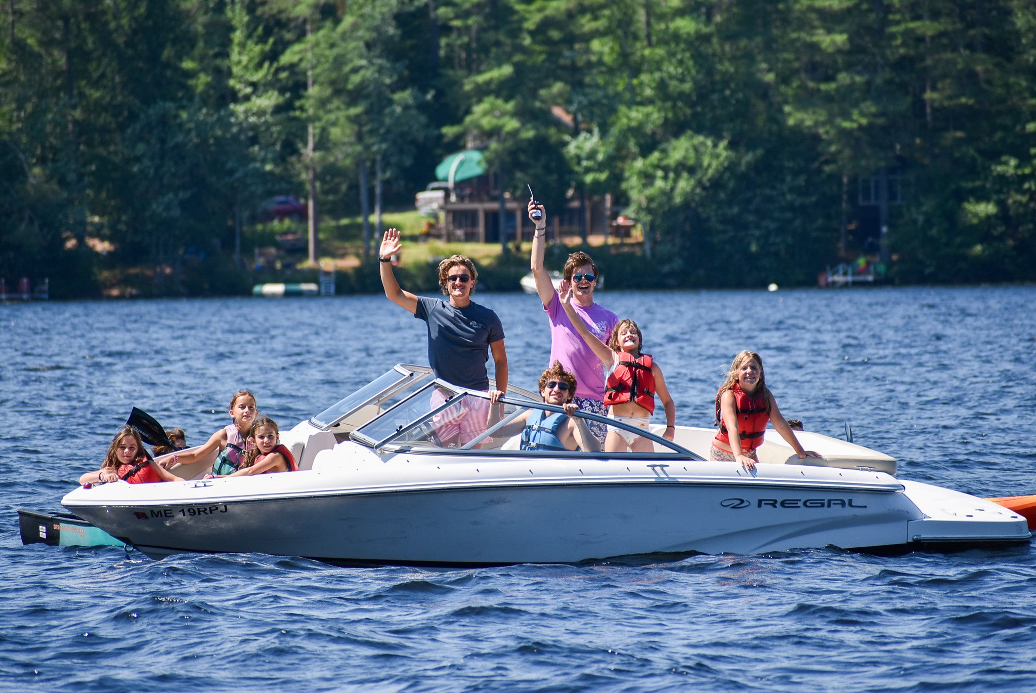 Camp Kingswood campers on a boat