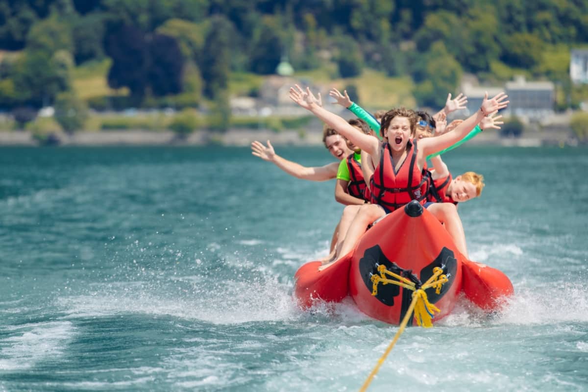 Kids on the lake at Camp Suisse