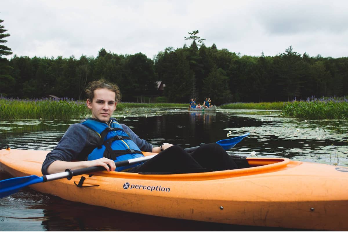 Camper kayaking in a lake
