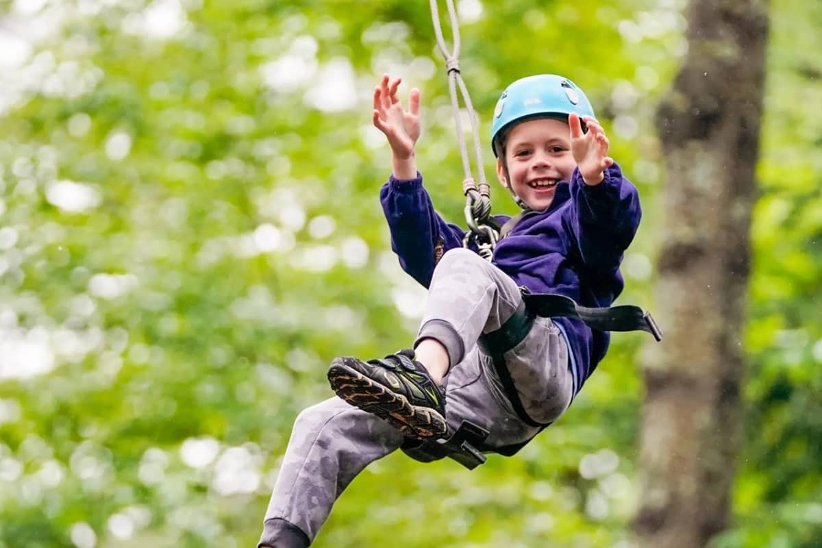Zip lining at Camp Walt Whitman