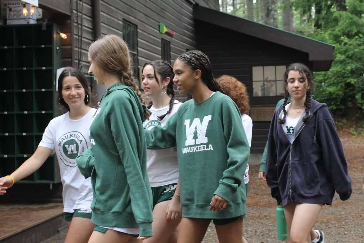 Girls walking around at Camp Waukeela
