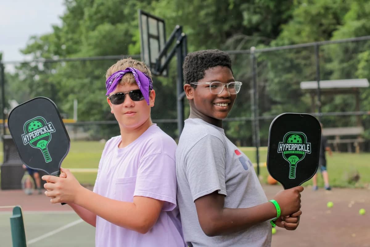 Campers playing pickleball