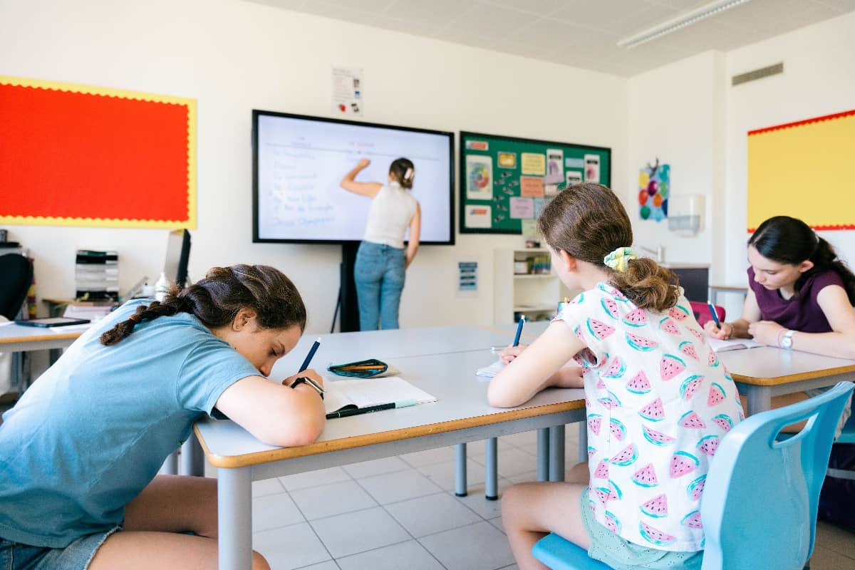 Campers learning in a classroom