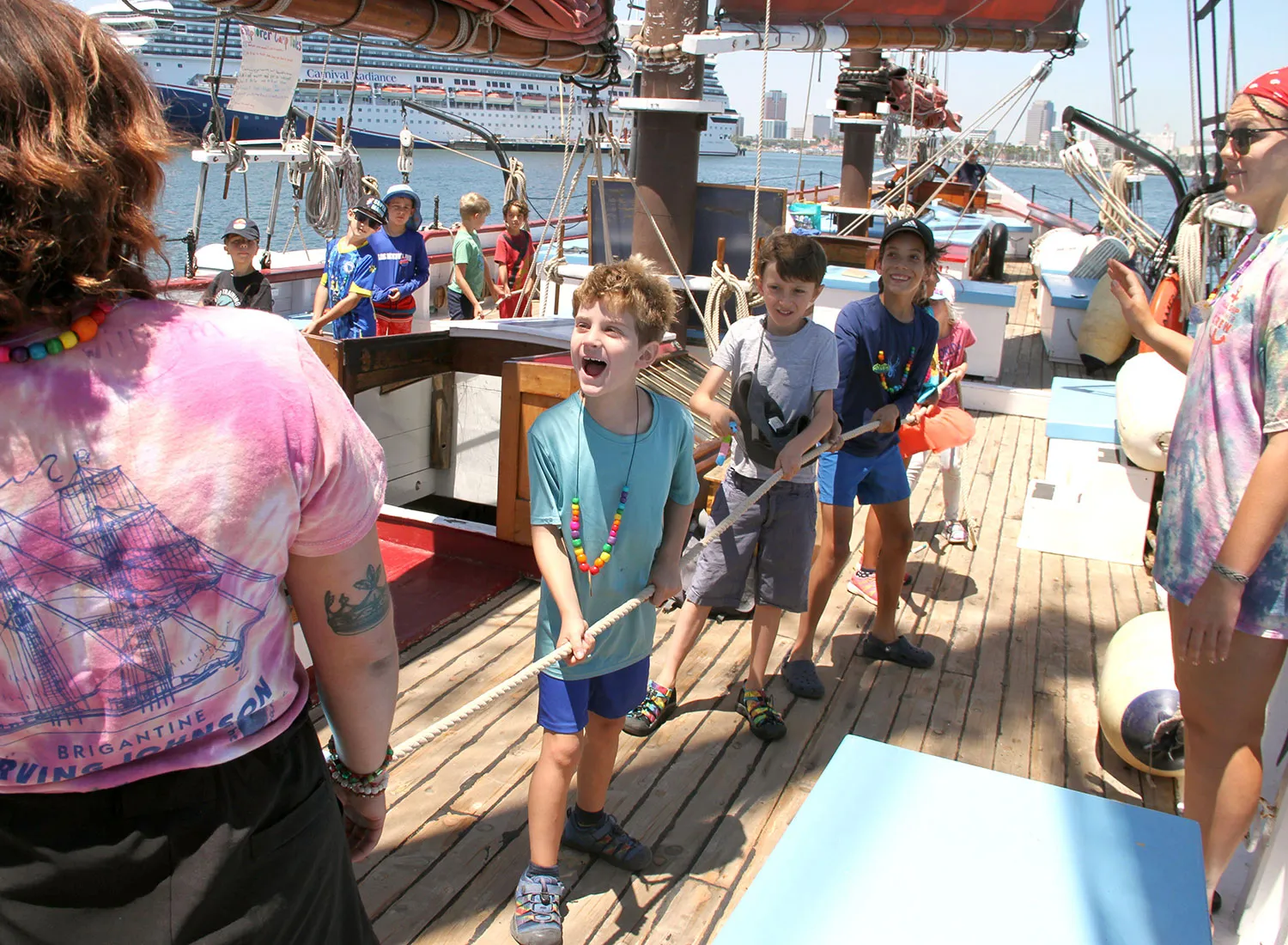 Campers practicing their sailing skills on the boat