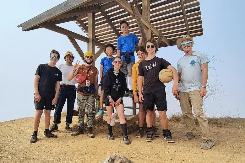 Kids on land holding a basketball