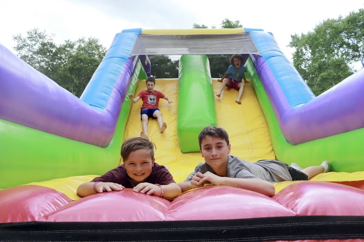 Kids going down slide