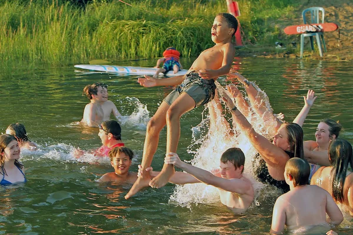 Kids playing in the water at Teen Time Of Edmonton Summer Camp