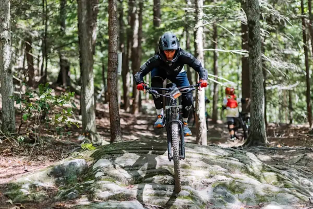 Child mountain biking at The Bement School summer program