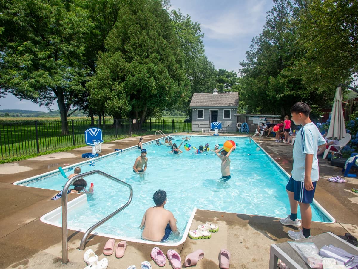 Kids enjoying the swimming pool during the summer