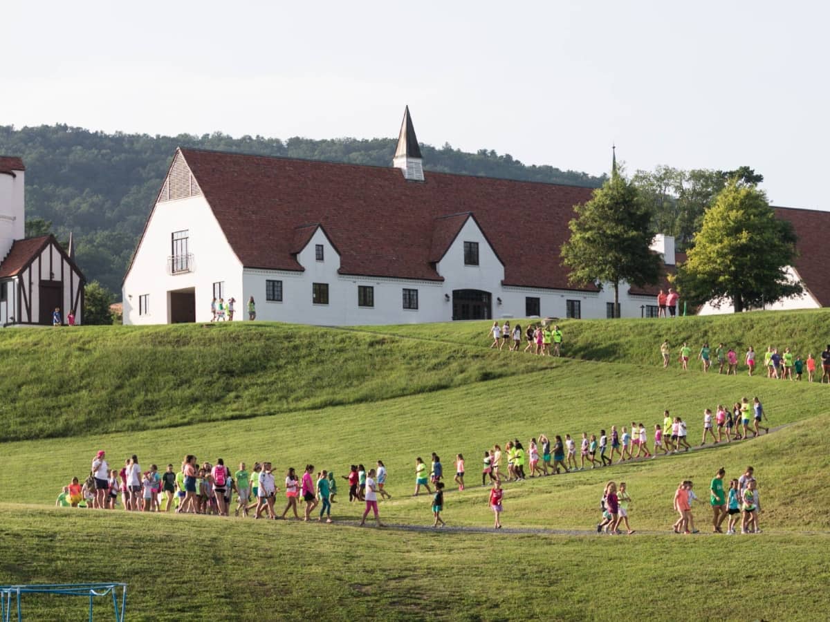 Kids outdoors with church in background at WinShape Camps