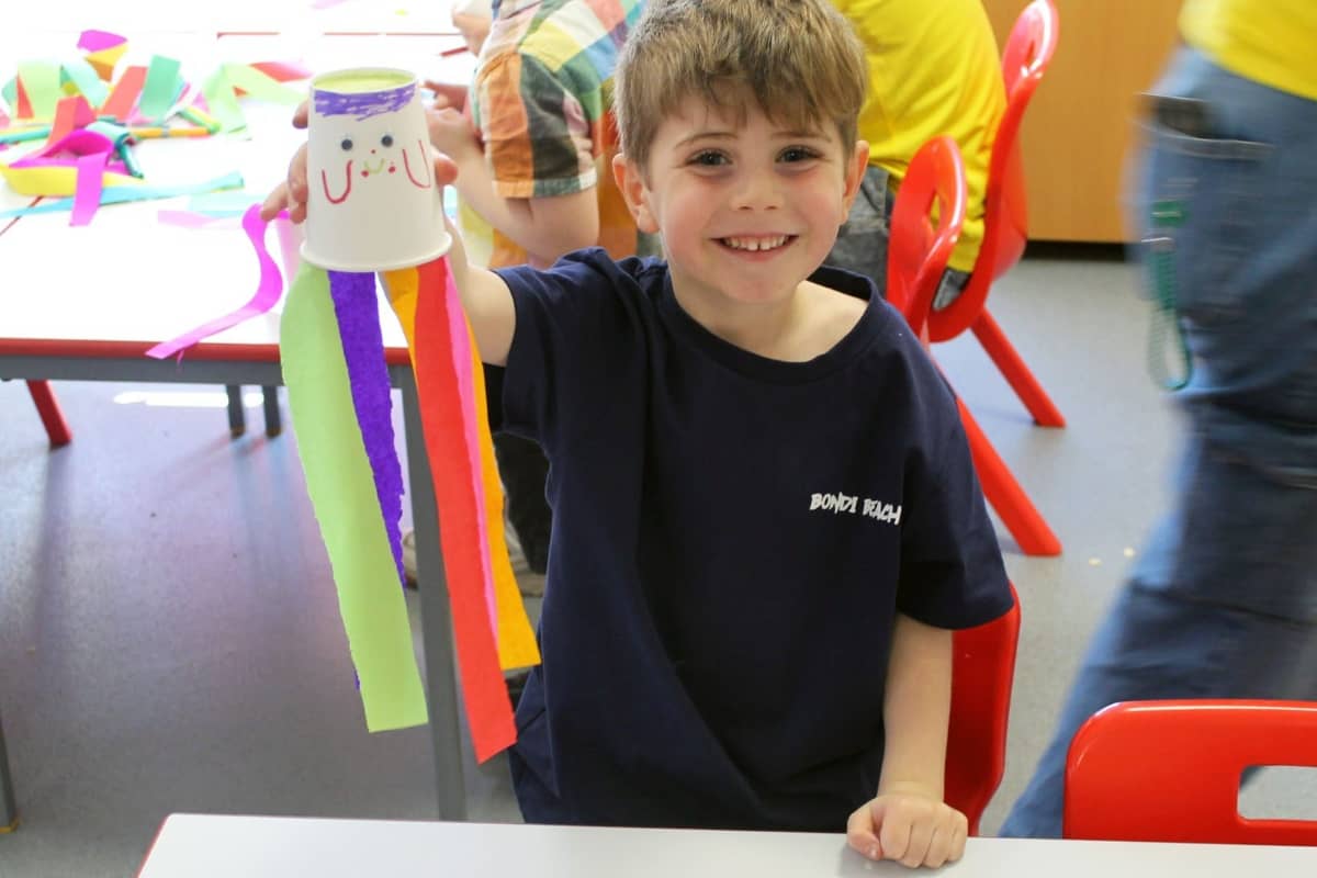 Kid with his arts and craft