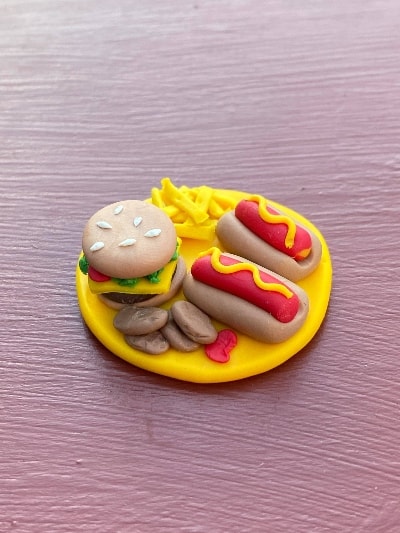 burger and fries clay figure